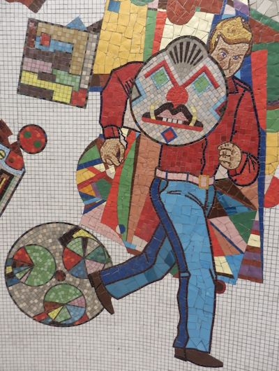 mosaic image of a man running with what might be a stylised boars head overlaying him